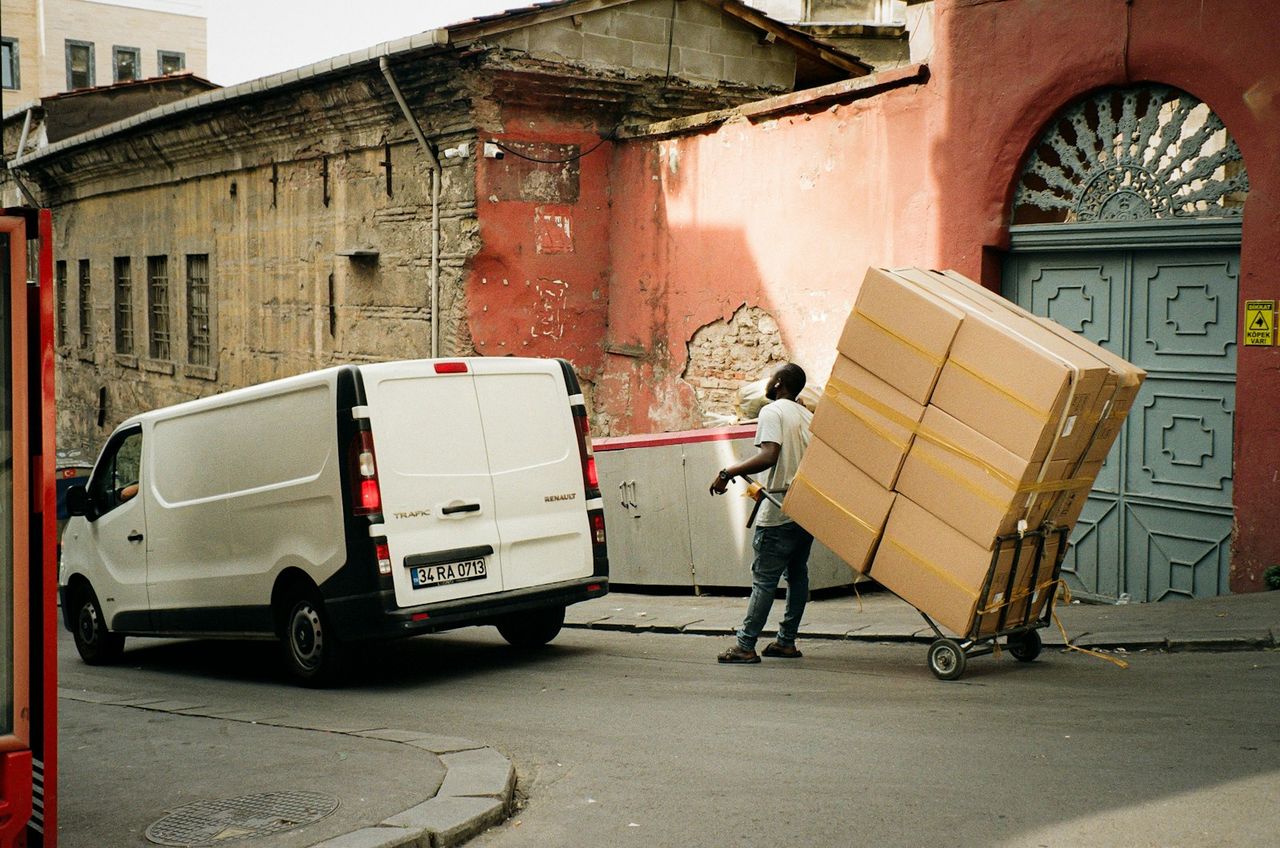 Loading cargo into the van for transport